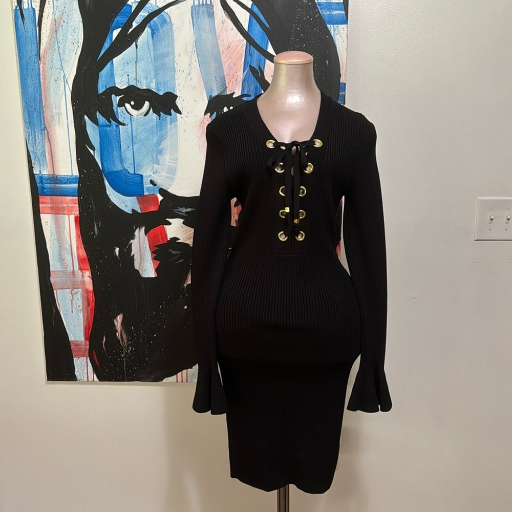Michael Kors black ribbed bodycon, long sleeve, tie front with gold accents.